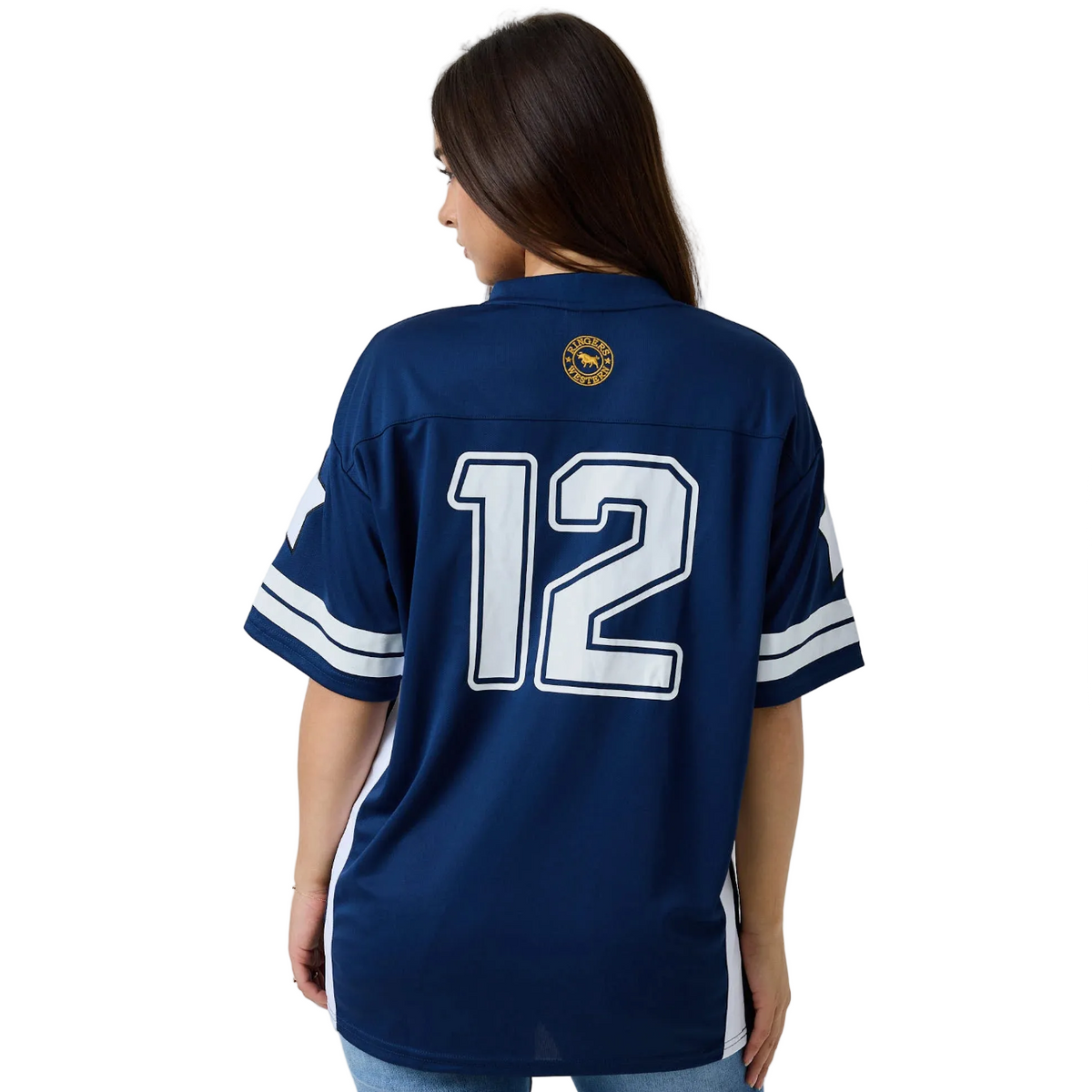 A woman shown from the back wearing a navy blue football-style jersey with the number 12 in white outlined on the back, plus white sleeve stripes and a small circular gold logo near the collar, against a white studio background.