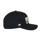 Green baseball cap with embroidered details on a white background