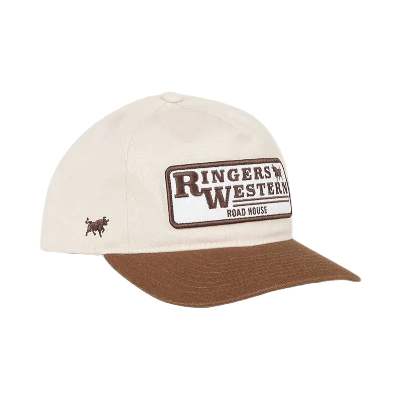 A cream-colored baseball cap with a brown visor and a front patch reading 'Ringers Western Road House' with a small brown logo on the side, set against a white background.