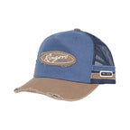 A distressed trucker hat featuring a blue front panel and brim, a tan brim edge, and a navy mesh back. The front has an oval patch with the word 'Ringers' in script, and a small side label.