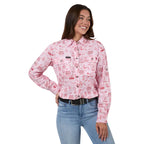 Woman wearing a pink patterned shirt and blue jeans on a white background