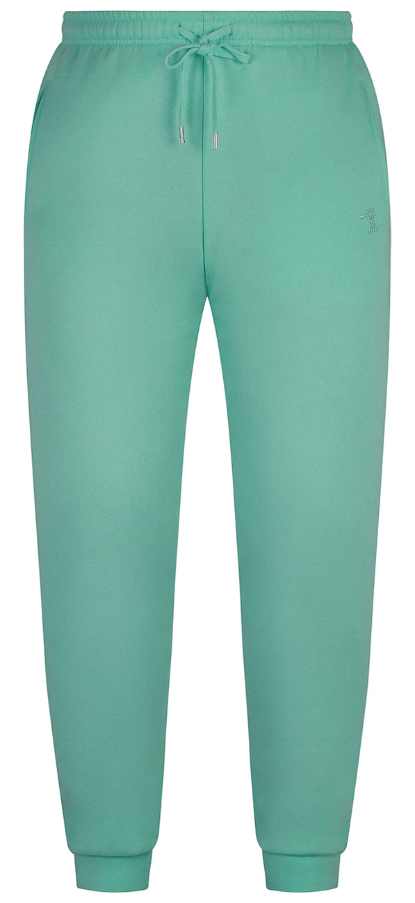 The Ritemate Unisex Pilbara Modern Fit Fleece Trackpants (RMPC070) in Beach Glass feature an elastic waistband with drawstring, side pockets, fitted ankle cuffs, and subtle windmill embroidery for a modern touch.