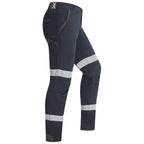 Side view of a pair of dark navy Ritemate Unisex RMX Flexible Fit Tactical Pants (RMX011R) with high-visibility reflective stripes on the thighs and lower legs, shown against a plain white background.