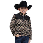 A smiling young boy wears the Roper Boys L/S Pullover (39692210) Black—a patterned brown and black fleece with a stand-up collar and 1/4 zip—paired with a black cowboy hat and blue jeans, standing with one hand in his pocket.