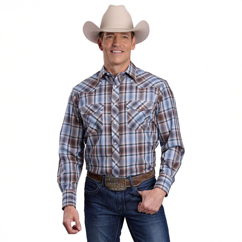 A man wearing a beige cowboy hat, jeans, a large belt buckle, and a Roper Mens Karman Classic 55/45 Collection L/S Plaid Brown Shirt stands smiling with his hands at his sides against a plain white background.