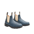 The Rossi Boots Unisex Spinifex Elastic Sided Boots (404 STM) Storm feature blue yak leather, beige elastic side panels, black anti-slip soles, and "Rossi" pull tabs at the heel and tongue.