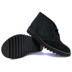Black Rossi Men's Ripple Desert Boots (4046) with white contrast stitching and a rugged treaded sole, shown from the side and bottom on a white background.