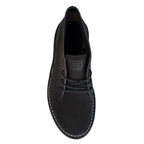 A black Rossi Men's Ripple Desert Boots (4046) with white contrast stitching, shown from the top on a white background.