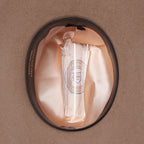 The inner of a sand Statesman Serpentine Fur Blend Hat (21050060) with an inner leather band and satin lining.