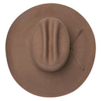 A top view of a sand Statesman Serpentine Fur Blend Hat (21050060) with a wide brim, a pinched crown, and a matching ribbon band, shown on a plain white background.