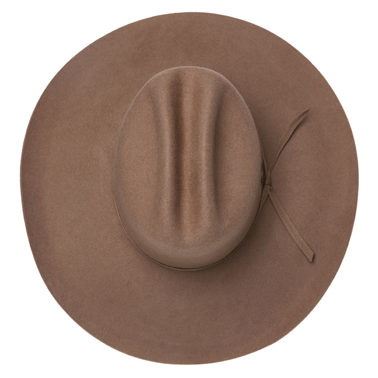 A top view of a sand Statesman Serpentine Fur Blend Hat (21050060) with a wide brim, a pinched crown, and a matching ribbon band, shown on a plain white background.