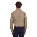 A man viewed from behind, modelling a sand coloured Thomas Cook Heavy Drill Half Button L/S Work Shirt (TCP1120163) paired with navy blue pants and a tan belt, on a white background.