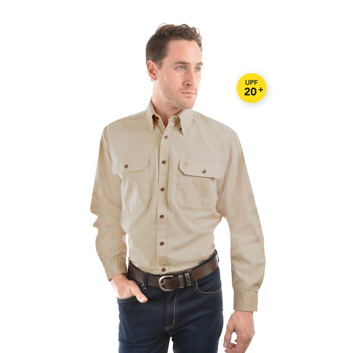 A man modelling a bone Thomas Cook Light Drill Full Button L/S Shirt (TCP1125005) paired with a brown leather belt and denim jeans.