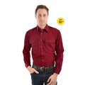A man modelling a red Thomas Cook Light Drill Full Button L/S Shirt (TCP1125005) paired with a brown leather belt and denim jeans.
