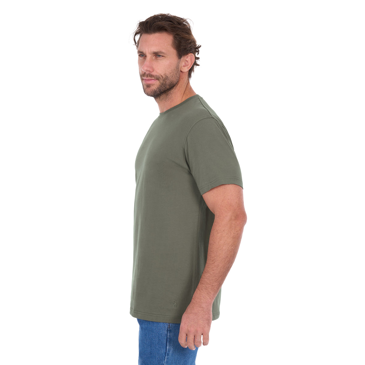 A man in profile modelling a military green Thomas Cook Men's Classic Fit Short Sleeve Tee (TCP1514051) paired with blue denim jeans on a white background.