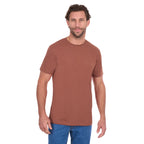 A man modelling a rust Thomas Cook Men's Classic Fit Short Sleeve Tee (TCP1514051) paired with blue denim jeans on a white background.
