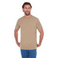 A man modelling a sand Thomas Cook Men's Classic Fit Short Sleeve Tee (TCP1514051) paired with blue denim jeans on a white background.