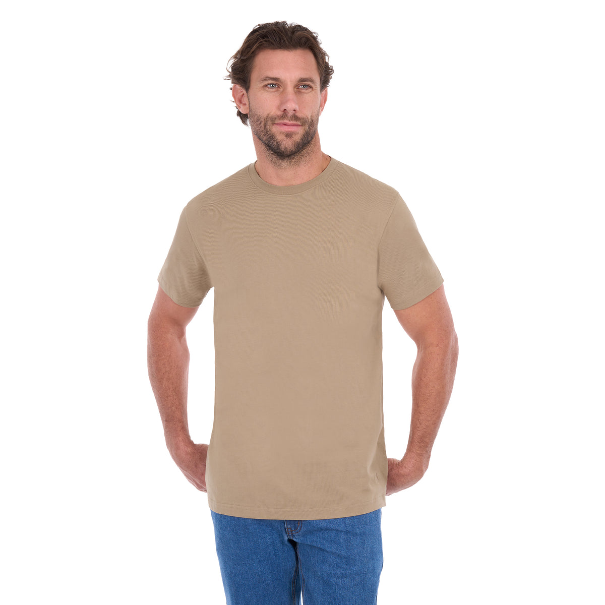 A man modelling a sand Thomas Cook Men's Classic Fit Short Sleeve Tee (TCP1514051) paired with blue denim jeans on a white background.
