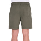 A man modelling a pair of military green Thomas Cook Men's Darcy Shorts (TCP1309037), shown from the back, with a white background.