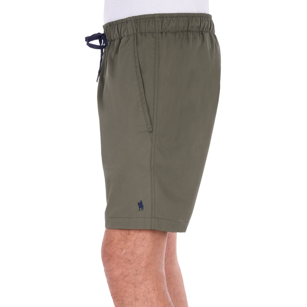 A man modelling a pair of military green Thomas Cook Men's Darcy Shorts (TCP1309037), shown from the side, with a white background.