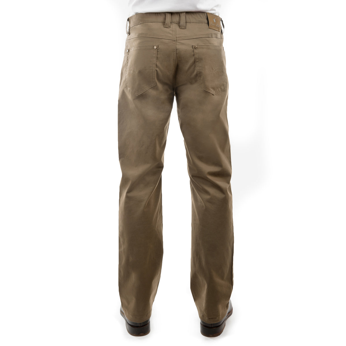 A pair of Thomas Cook Men's Jake Comfort Waist Jeans (TCP1215031) in a mulch colour, shown from behind on a model from the waist down wearing a white shirt and dark brown leather shoes against a white background.