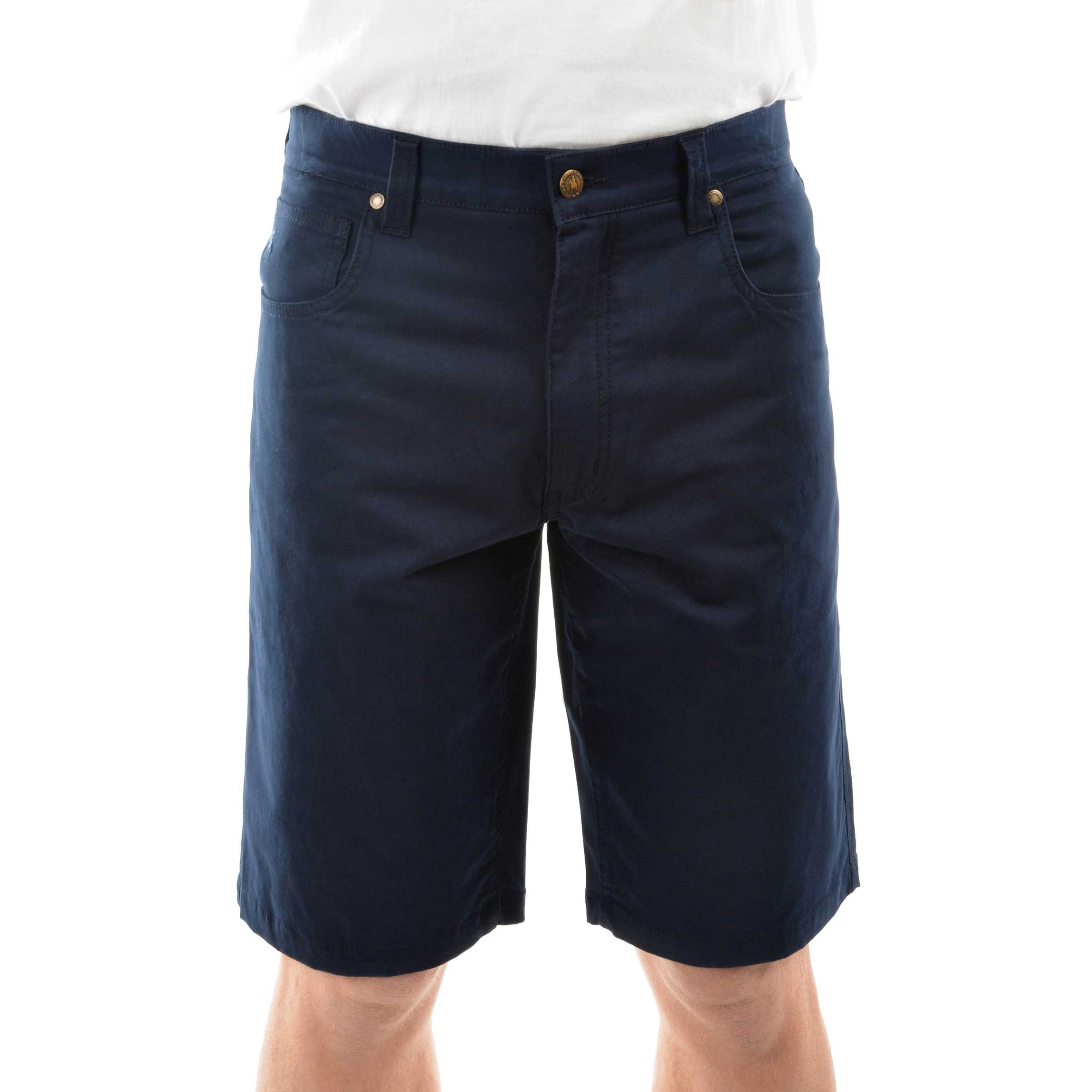 A man wearing dark navy blue Thomas Cook Men's Jake Comfort Waist Shorts (TCP1307031) with a white shirt partially visible at the top, photographed against a plain white studio background.