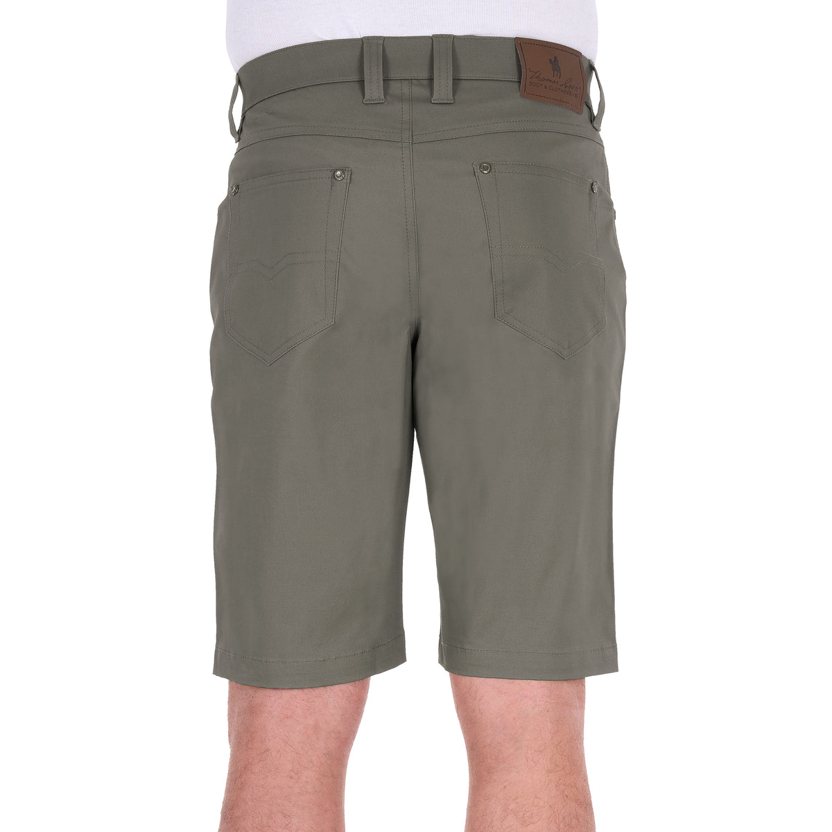 A back view of a man wearing stone Thomas Cook Men's Jake Comfort Waist Shorts (TCP1307031) with a white shirt partially visible at the top, photographed against a plain white studio background.