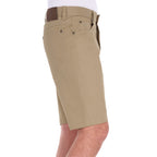 A side view of a man wearing stone Thomas Cook Men's Jake Comfort Waist Shorts (TCP1307031) with a white shirt partially visible at the top, photographed against a plain white studio background.