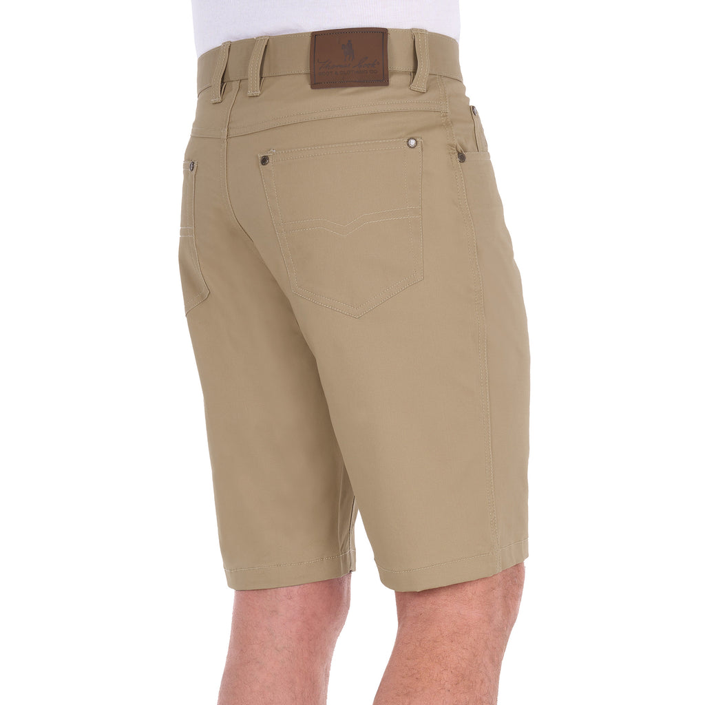 A 3-4 back view of a man wearing sand Thomas Cook Men's Jake Comfort Waist Shorts (TCP1307031) with a white shirt partially visible at the top, photographed against a plain white studio background.