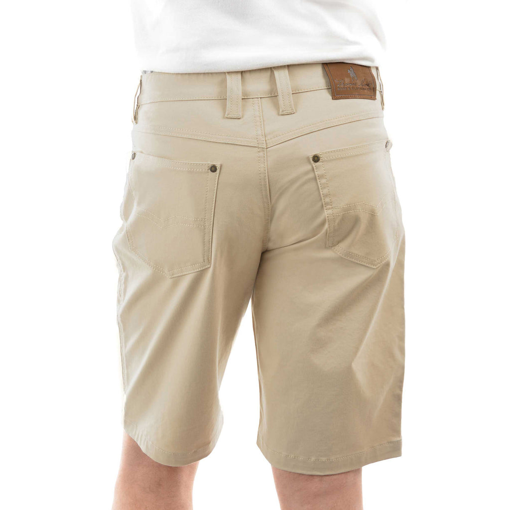 A man viewed from behind wearing stone Thomas Cook Men's Jake Comfort Waist Shorts (TCP1307031) with a white shirt partially visible at the top, photographed against a plain white studio background.