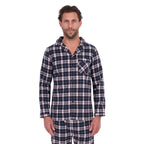 A man wearing navy blue, white, and grey plaid Thomas Cook Men's Long Sleeve PJs (TCP1997PJS), standing against a solid white background.