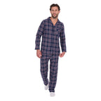 A man wearing navy blue and white plaid Thomas Cook Men's Long Sleeve Pyjamas (TCP1997PJS), standing against a solid white background.