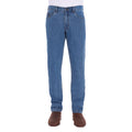 A man shown from the waist down, modelling a pair light blue Thomas Cook Men's Lochie Tailored Jeans (TCP1226064) paired with brown boots on a white background.