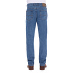 A man shown from the waist down, from behind, modelling a pair light blue Thomas Cook Men's Lochie Tailored Jeans (TCP1226064) paired with brown boots on a white background.