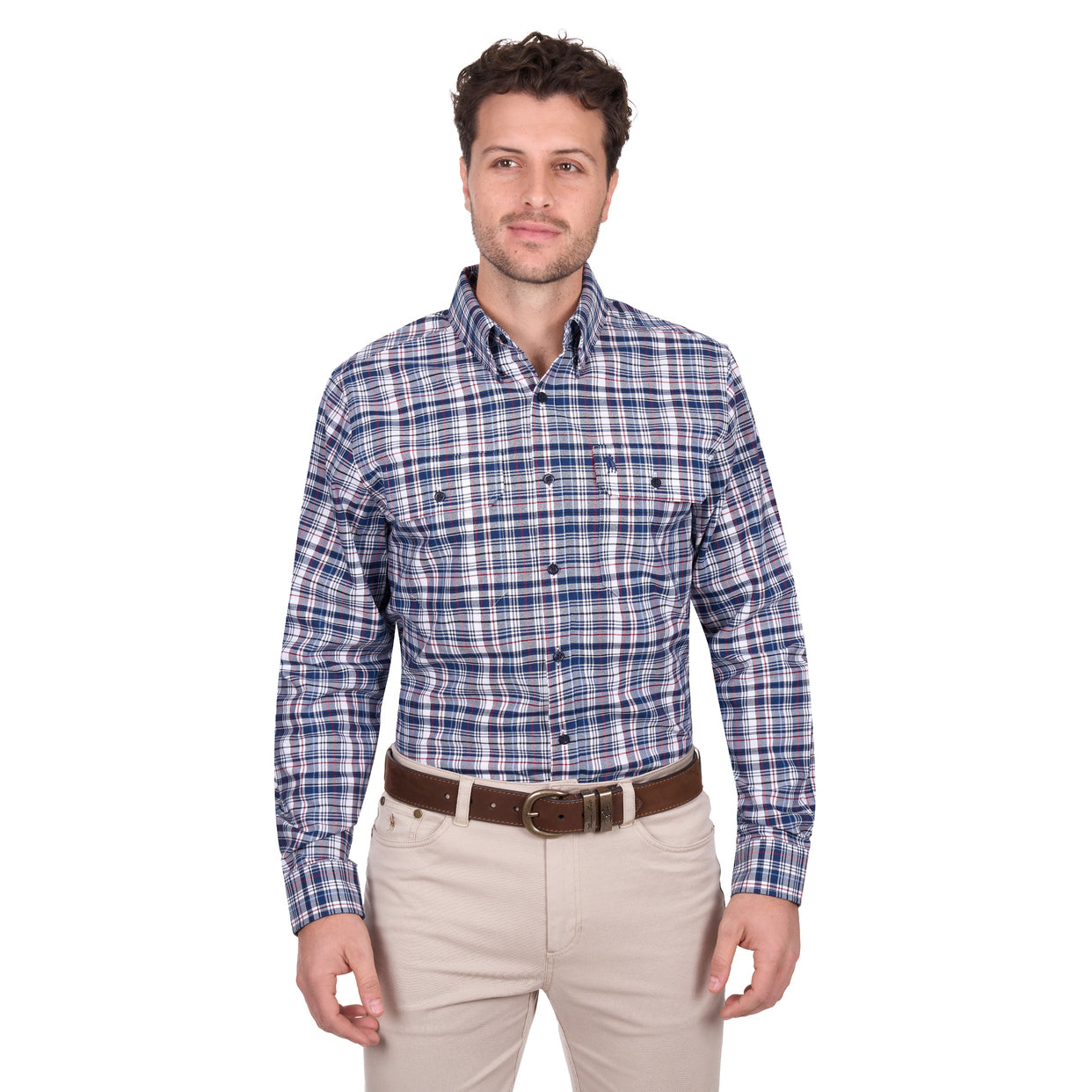 A man stands facing forward in a Thomas Cook Mens Sean L/S Shirt (T6W1115032) Blue/Red, paired with beige pants and a brown belt, against a white background.
