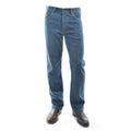 A pair of stonewash Thomas Cook Men's Stretch Straight Leg Jeans (TCP1230381) shown from the waist down, paired with dark brown leather boots against a plain white background.