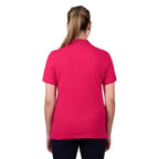 A woman modelling a bright rose coloured Thomas Cook Women's Classic Stretch Short Sleeve Polo Shirt (TCP2512059), set against a plain white background.