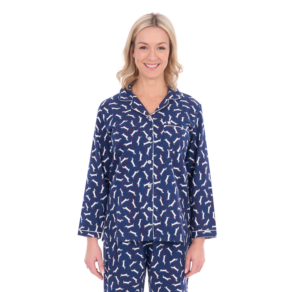 A woman modelling navy and white plaid Thomas Cook Women's Long Sleeve Pyjamas (TCP2982PJS) against a plain white background.