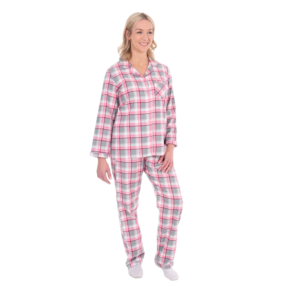 A woman modelling pink, grey, and white plaid Thomas Cook Women's Long Sleeve Pyjamas (TCP2982PJS) against a plain white background.