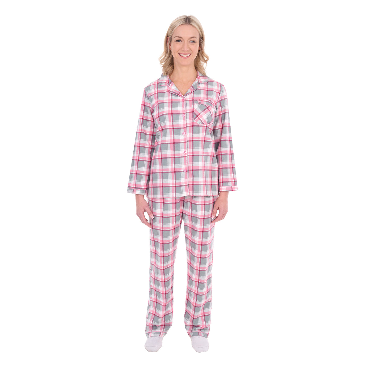 A woman modelling pink, grey, and white plaid Thomas Cook Women's Long Sleeve Pyjamas (TCP2982PJS) against a plain white background.