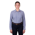 A woman modelling a Thomas Cook Women's Lawson Long Sleeve Shirt (TCP2112178) with vertical blue and white stripes, paired with dark pants and a brown belt, against a plain white background.
