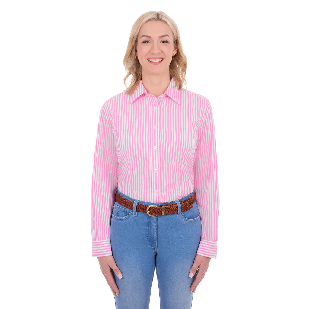 A woman modelling a Thomas Cook Women's Lawson Long Sleeve Shirt (TCP2112178) with blue jeans and a brown belt, shot against a solid white background.