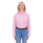 A woman modelling a Thomas Cook Women's Lawson Long Sleeve Shirt (TCP2112178) with blue jeans and a brown belt, shot against a solid white background.