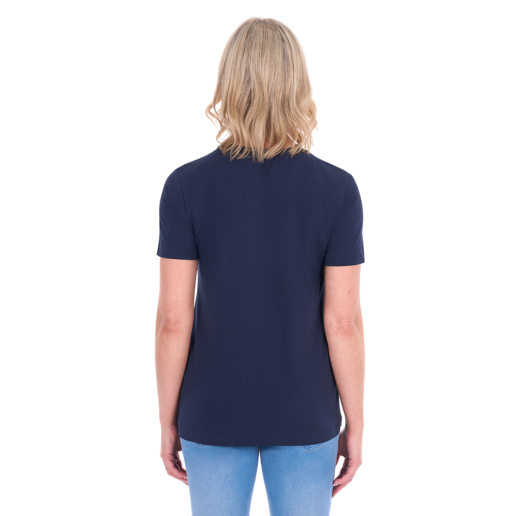 A woman shown from behind modelling a navy blue Thomas Cook Women's Round Neck Short Sleeve Tee (TCP2515104) paired with blue denim jeans on a white background.