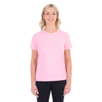 A woman modelling a rose pink Thomas Cook Women's Round Neck Short Sleeve Tee (TCP2515104) paired with blue denim jeans on a white background.
