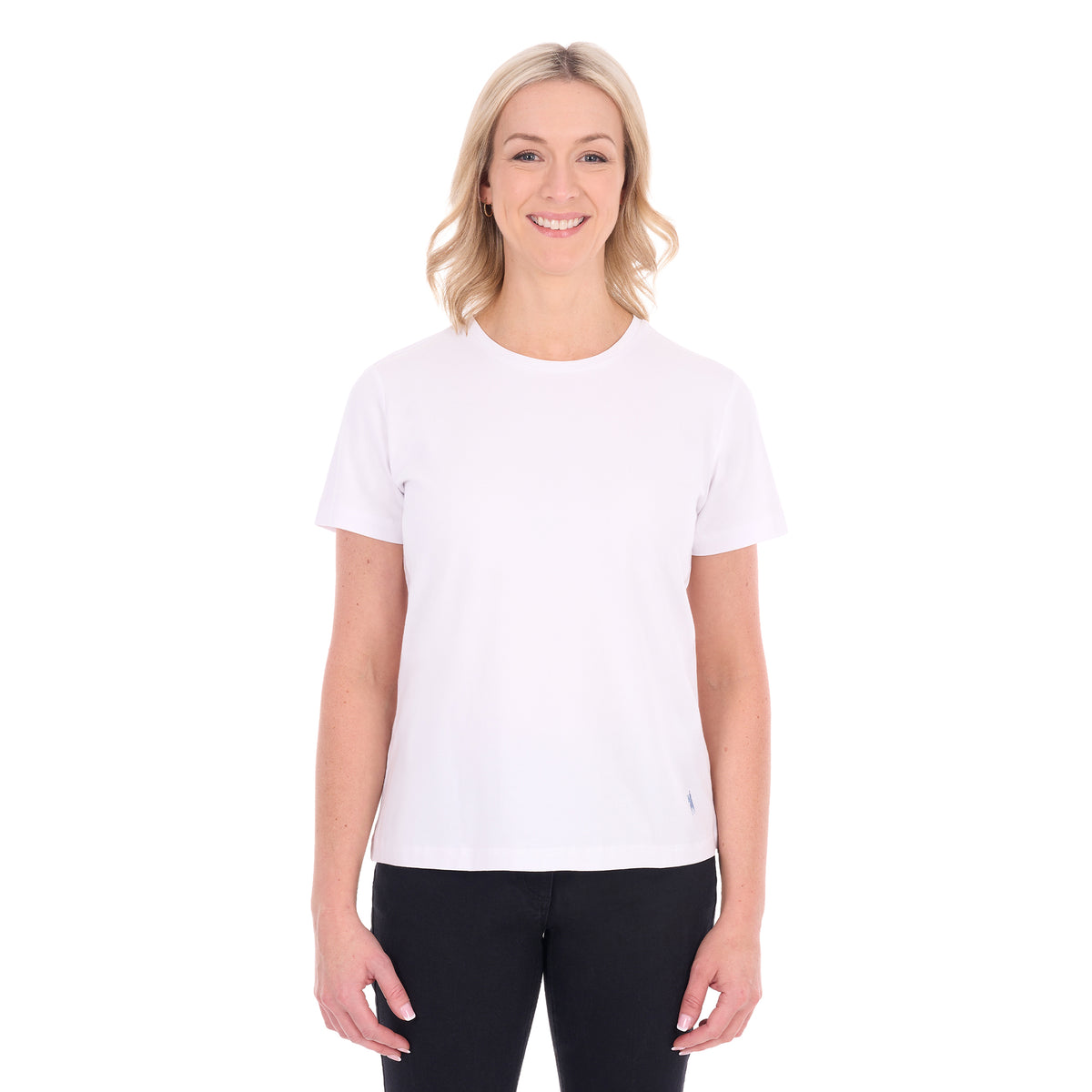 A woman modelling a white Thomas Cook Women's Round Neck Short Sleeve Tee (TCP2515104) paired with blue denim jeans on a white background.