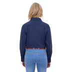 A woman viewed from behind, modelling a navy blue Thomas Cook Women's Stretch Drill Half Button Long Sleeve Work Shirt (TCP2100106), paired with blue jeans and a brown woven belt, against a plain white background.