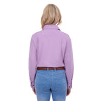 A woman viewed from the back wearing a lilac Thomas Cook Women's Stretch Drill Half Button Long Sleeve Work Shirt (TCP2100106) tucked into light blue jeans with a brown braided belt, against a plain white background.