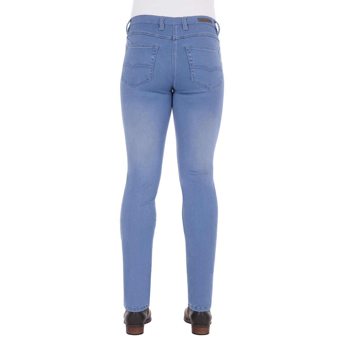 Light wash blue Thomas Cook Women's Suzie Slimmer Leg Jeans 32 Leg (TCP2215128) shown from the back on a model from the waist down, paired with black boots against a plain white background.
