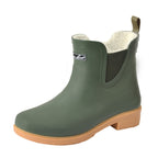 The Thomas Cook Womens Wynyard Gumboots (T6W28503) in Dark Khaki feature a green ankle-high design with tan outsole, elastic side panel, back pull tab, and soft white faux fur lining for comfort.